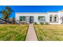 Charming single-story home with well-maintained lawn and walkway at 5047 N 83Rd St, Scottsdale, AZ 85250