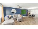 Open-concept living area with a comfortable sectional sofa and great natural light at 5047 N 83Rd St, Scottsdale, AZ 85250