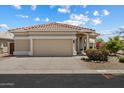 Attractive single-story home showcasing a two-car garage and desert landscaping at 11650 W Pincushion Ct, Surprise, AZ 85378