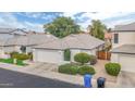 Aerial view of a single-story home with a two-car garage, desert landscaping, and a modern exterior at 15815 N 4Th Dr, Phoenix, AZ 85023