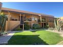 Charming apartment featuring well-maintained landscaping, private balconies, and convenient stair access at 1831 W Mulberry Dr # 241, Phoenix, AZ 85015