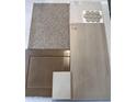 Selection of interior design materials including carpet, tile, quartz, and wood finish for cabinets at 23040 E Watford Dr, Queen Creek, AZ 85142