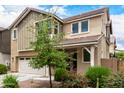 Inviting home with well-manicured landscaping, mature trees, and vibrant flowering bushes create a picturesque setting at 734 W Winchester Dr, Chandler, AZ 85286