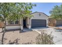 Charming single-story home featuring a two-car garage and neutral stucco facade at 2625 W Gaby Rd, Phoenix, AZ 85041