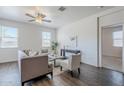 Comfortable living room with modern ceiling fan and neutral decor at 2625 W Gaby Rd, Phoenix, AZ 85041
