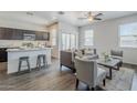 Open-concept living room boasts lots of natural light and modern furnishings at 2625 W Gaby Rd, Phoenix, AZ 85041