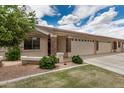 Attractive single-story home featuring stone veneer accents on the facade and a well-kept lawn at 2662 S Springwood Blvd # 462, Mesa, AZ 85209