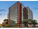 Striking exterior view of a high-rise building with a modern architectural design and glass facade at 4808 N 24Th St # 231, Phoenix, AZ 85016