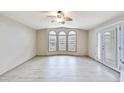 Airy living room with beautiful windows and modern floors, ready for personalization at 5735 E Mcdowell Rd # 67, Mesa, AZ 85215