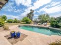 Relaxing pool view with lounge chairs, perfect for enjoying sunny days and outdoor entertainment at 6735 E San Juan Ave, Paradise Valley, AZ 85253