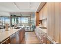 Well-equipped kitchen with stainless steel appliances, sleek cabinets, and hardwood floors at 7120 E Kierland Blvd # 507, Scottsdale, AZ 85254