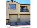 Attached garage with upper balcony perfect for enjoying outdoor seating and fresh air at 1265 S Aaron -- # 299, Mesa, AZ 85209