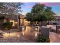 Inviting desert landscape with stylish walkway and courtyard lighting at 15135 E Sundown Dr, Fountain Hills, AZ 85268