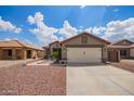 Charming single-Gathering home boasts a 2-car garage, desert landscaping, and inviting curb appeal at 15633 W Acapulco Ln, Surprise, AZ 85379