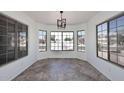 Bright dining area with large windows providing ample natural light and scenic views at 6603 W Saddlehorn Rd, Phoenix, AZ 85083