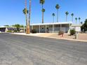 Inviting single-story home with a covered porch and well-maintained surroundings, perfect for relaxation at 7300 N 51St Ave # G102, Glendale, AZ 85301