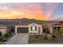 Charming single-Gathering home featuring a tile roof, well-manicured landscaping, and a two-car garage at 11626 E Yeager Cyn, Gold Canyon, AZ 85118