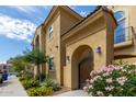 Beautiful two-story home with well-maintained landscaping and a charming gated front entrance at 1367 S Country Club Dr # 1320, Mesa, AZ 85210