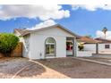 A charming single story home with a front yard with low maintenance landscaping at 17616 N 20Th Dr, Phoenix, AZ 85023