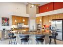 Spacious kitchen featuring a large island, stainless steel appliances, and custom cabinets at 4448 E Sleepy Ranch Rd, Cave Creek, AZ 85331