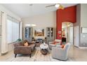 Cozy living room with high ceilings, built-in cabinets, and comfortable seating area at 4448 E Sleepy Ranch Rd, Cave Creek, AZ 85331