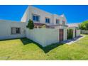 Charming exterior with well-manicured lawn and landscaped yard creating inviting curb appeal at 7830 E Valley Vista Dr, Scottsdale, AZ 85250