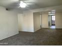 Comfortable living room with an open concept and abundant natural light coming through the windows at 1927 E Hampton Ave # 260, Mesa, AZ 85204