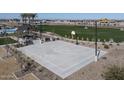 Outdoor basketball court in a community park, perfect for recreation and neighborhood gatherings at 22699 E Happy Rd, Queen Creek, AZ 85142