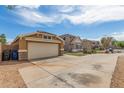 Street view of a single-story home with a two-car garage and desert landscaping at 2341 S Gordon --, Mesa, AZ 85209