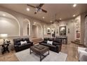 Open-concept living area with hardwood floors, recessed lighting and seamless flow throughout the home at 39241 N Boulder View Dr, Scottsdale, AZ 85262