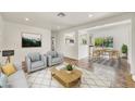 Inviting living room with stylish decor, open to dining and kitchen at 508 S Pasadena --, Mesa, AZ 85210