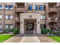 Inviting entrance to building featuring well-manicured plants at 5350 E Deer Valley Dr # 3274, Phoenix, AZ 85054