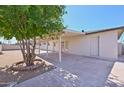 Large, shaded backyard patio area, perfect for outdoor entertaining and relaxation at 1532 W 6Th St, Tempe, AZ 85281
