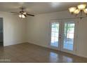 Bright living room with tile floors and sliding glass doors to the patio at 1532 W 6Th St, Tempe, AZ 85281