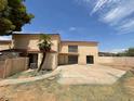 Inviting two-story home featuring a Spanish-style roof, private balcony, spacious yard, and stucco siding at 15650 N 19Th Ave # 1206, Phoenix, AZ 85023