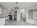 Modern kitchen with stainless steel appliances and ample cabinet space offers functionality and style at 1847 E Kirkland Ln # C, Tempe, AZ 85281