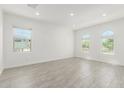 Bright living room features neutral decor and tile flooring, with natural light at 4051 S Galaxy Ln, Mesa, AZ 85212