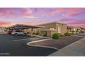 Low angle view of a home with a covered parking spot in a desert community at 420 W Yukon Dr # 4, Phoenix, AZ 85027