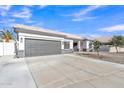 Spacious driveway leading to a two-car garage on a charming single-story home at 1071 N Danyell Dr, Chandler, AZ 85225