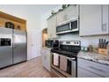 Well-equipped kitchen with stainless steel appliances and neutral color cabinetry at 11207 W Turney Ave, Phoenix, AZ 85037