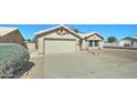 Traditional-style home with desert landscaping, a private drive and an attached garage at 19808 N 3Rd Ave, Phoenix, AZ 85027