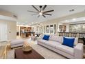 Bright living room with an open floor plan, modern decor, and plenty of natural light at 22233 N 54Th Way, Phoenix, AZ 85054