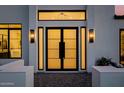 Stylish front door entrance featuring modern design and inviting lighting at 3301 E Elm St, Phoenix, AZ 85018