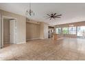 Open-concept layout featuring tile flooring and a kitchen island, ideal for entertaining at 4617 E Culver St, Phoenix, AZ 85008