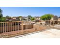 Scenic neighborhood view showcasing surrounding homes, landscaping, and distant mountains from elevated position at 5553 W Minton Ave, Laveen, AZ 85339