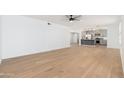 Open-concept living space featuring sleek, modern finishes and neutral tones at 6127 N 16Th Pl, Phoenix, AZ 85016