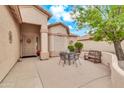 Relaxing outdoor patio area, featuring stylish seating and a peaceful ambiance for enjoying the outdoors at 6141 S Bradshaw Way, Chandler, AZ 85249
