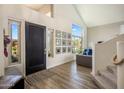 Inviting entryway with wood floors, lots of light, and decorative accents at 14545 N 99Th St, Scottsdale, AZ 85260