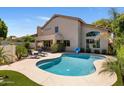 Backyard pool with lounge chairs and covered patio for outdoor entertaining at 14545 N 99Th St, Scottsdale, AZ 85260