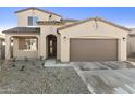 Charming two-story home with tile roof, stucco exterior, and a two-car garage at 19033 W Rose Ln, Waddell, AZ 85355